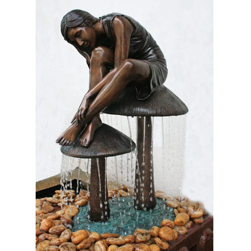 garden statue girl on mushroom